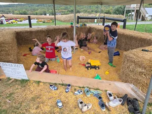 Kids playing in the corn box play area in Honey Brook, PA